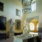 Image contains a view of the North Hall at Wilton House with Peter Scheemaker's statue of William Shakespeare.