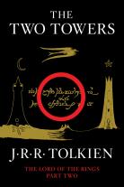 Cover of the book "The Two Towers", where a golden tower near a black tower is seen