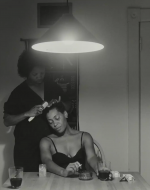 Weems, Carrie Mae. Untitled (Mother and Daughter combing) from The Kitchen Table Series. 1990.